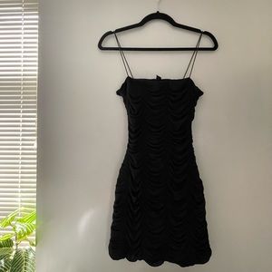 Windsor black tight fitting dress with open back